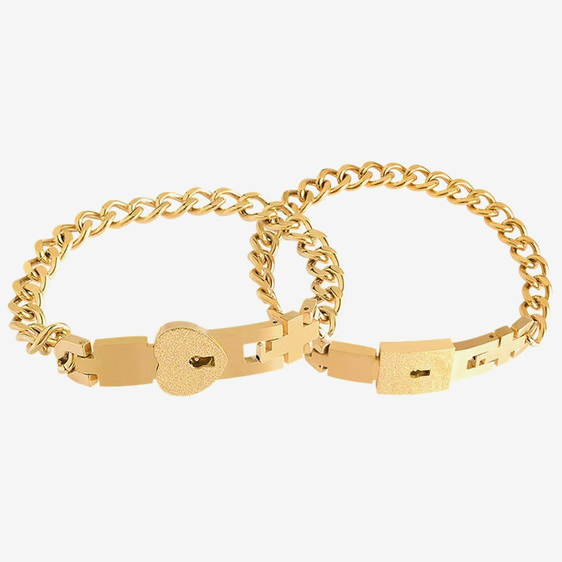 Matching bracelets with a heart-shaped padlock