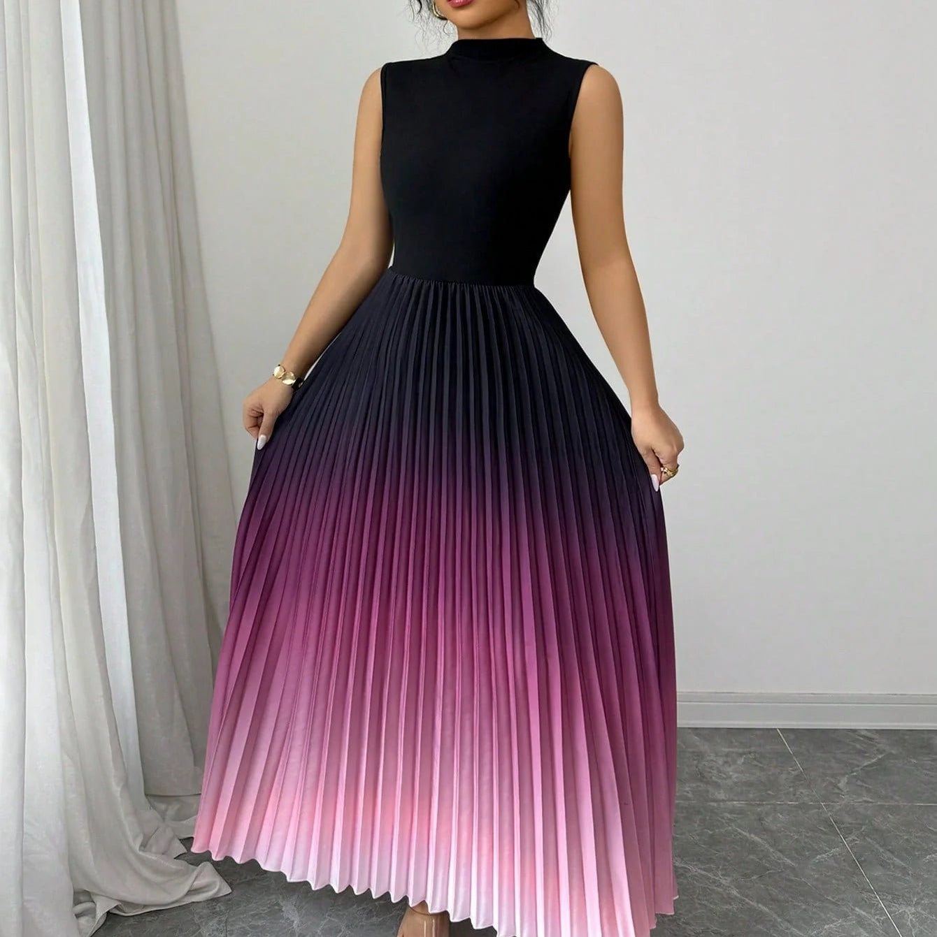 Sleeveless pleated maxi dress with an ombre effect and high neck