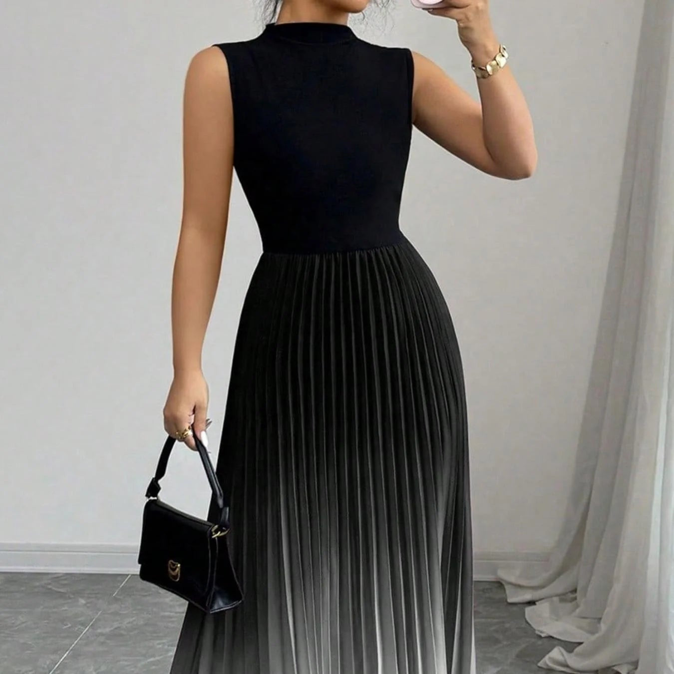 Sleeveless pleated maxi dress with an ombre effect and high neck