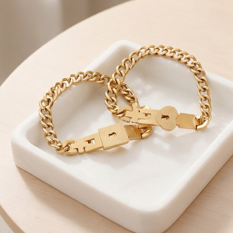 Matching bracelets with a heart-shaped padlock