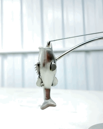 🎣Kalastaja, joka tasapainottaa veistosta