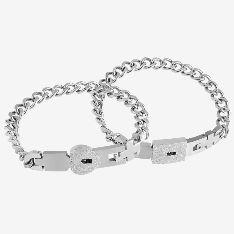 Matching bracelets with a heart-shaped padlock