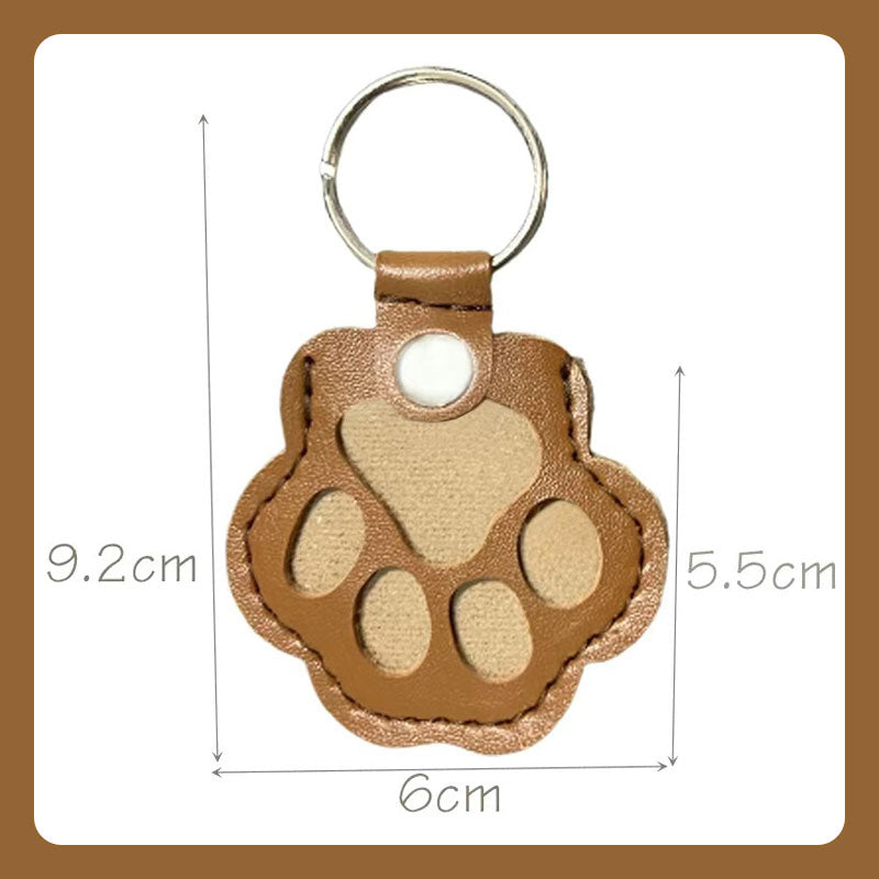 🔥🐾 Ajaton matkamuisto - tassukuvioinen nahkainen avaimenperä