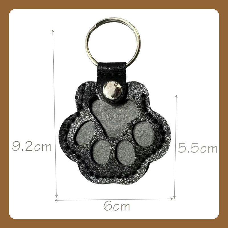 🔥🐾 Ajaton matkamuisto - tassukuvioinen nahkainen avaimenperä