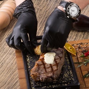 100/50 kpl mustia kertakäyttöisiä nitriilikäsineitä